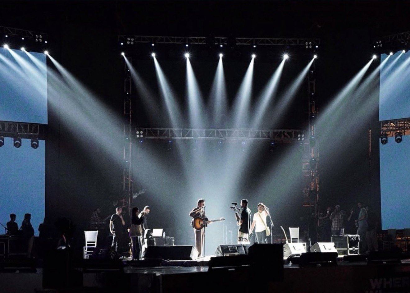 White beam lights over the Prism Fest stage